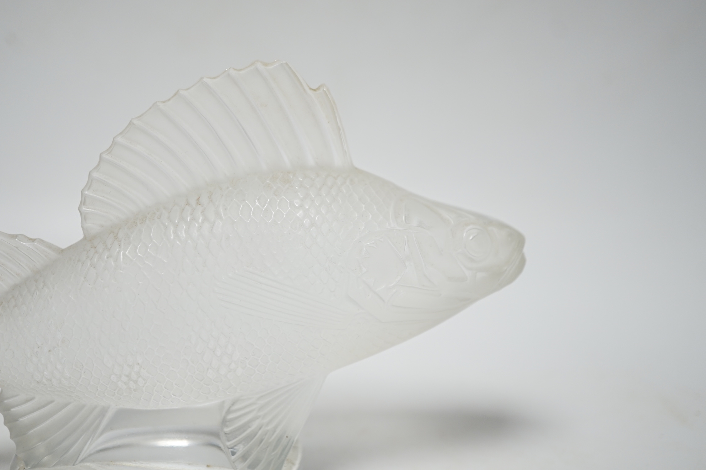 Rene Lalique, a frosted glass paperweight modelled as a fish, signed ‘Lalique France’ to base, 16cm wide